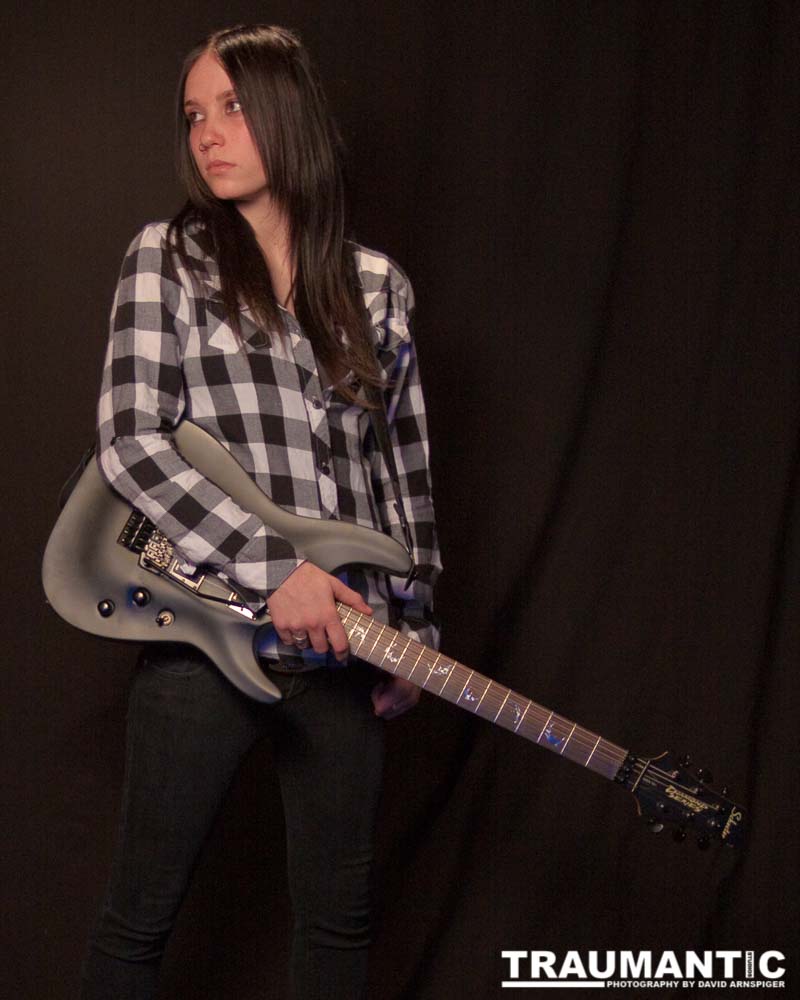 I saw an amazing picture on a web site of this female guitarist.  She was beautiful.  After a bit of searching, I was able to contact her and we did this shoot together.